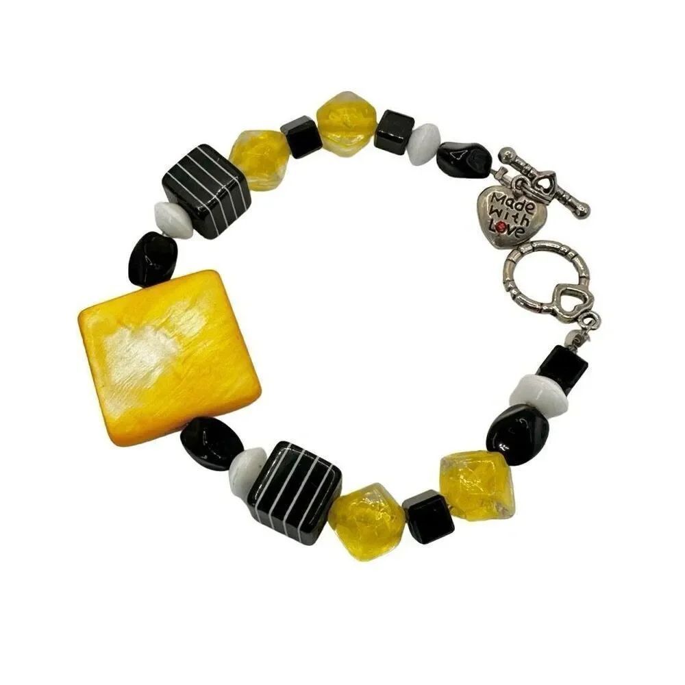 Yellow abalone and black beaded bracelet